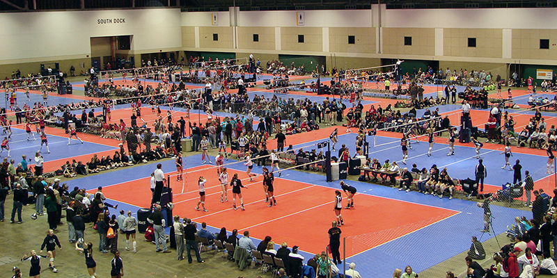 Multiple Volleyball Courts inside the KC Convention Center's Exhibit Hall