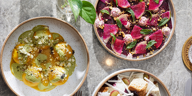 Three dishes on a table at The Town Company
